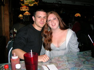 Young Man & Redheaded Wife looki